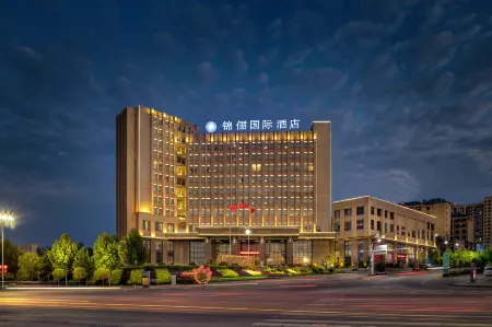 Jinli International Hotel (Dawu store) Отели в г. Даву