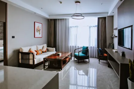 Bamin Hotel Apartment Отели рядом с достопримечательностью «Yike Zhaomeng Monument»