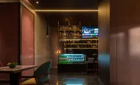 The GiorgioMorandi Hotels (Zaozhuang West Station Xuecheng Wanda Plaza) - bar