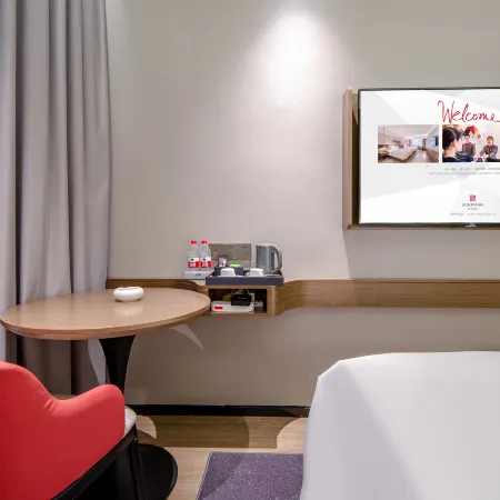 Borrman Hotel (Yulin Pedestrian Street Jincheng Center) Отели в г. Юйлинь