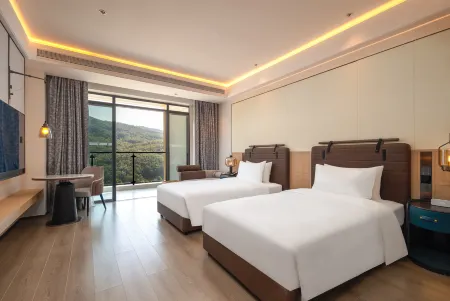 Wuzhishan Qingneng Lijingwan Hotel Отели рядом с достопримечательностью «Hainan Open University Wuzhishan Branch»