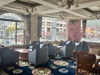 Jiuzhinian Baojinma Hotel
