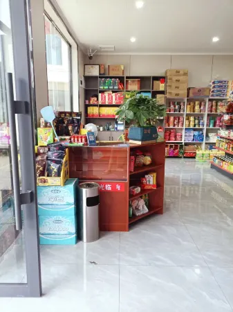 Wanchengwan Business Hotel Отели рядом с достопримечательностью «Yunzhong Lake Reservoir»