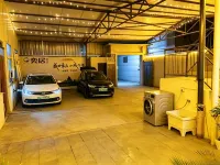 Yiju Homestay (Kaifeng Wansuishan Martial Arts City Millennium City Park) - Parkering