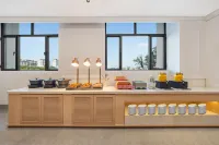 Vienna Hotel Qitai Jiangbulak Airport - servizio colazione