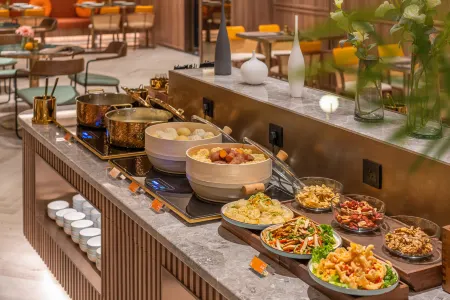 Orange Hotel (Wendeng Kunyu Road Liqun Branch) Отели рядом с достопримечательностью «Aodaliya Kunshilan Occupation Technology (Nan'an) College Weihai Branch»