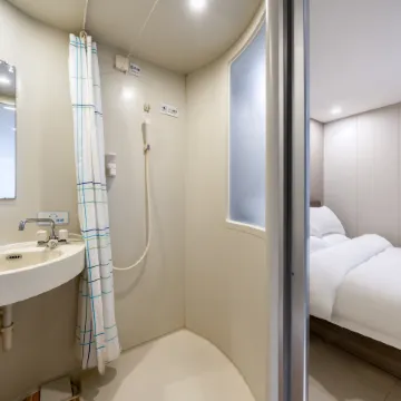 Chongqing • 100 Inn | WARMWIPEWHLBATHMERGEMNIMALMOD Hotel (Guanyinqiao Subway Station)