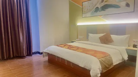 Q+ Nanxiong Xinhewan Business Hotel Отели рядом с достопримечательностью «Zhuji Ancient Lane»