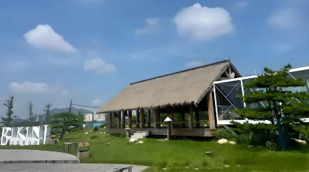 Shanhaiyunju · 180 ° Sea View Boutique Apartment Отели рядом с достопримечательностью «Three Reef Range Rover»