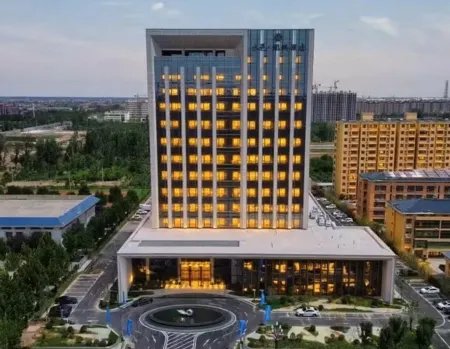 Dongming Shuiyi Kunpeng Hotel Отели в г. Дунмин
