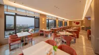 Zhenxiong Shengjin Hotel (Mission Hills Shopping Park) - Park Yeri