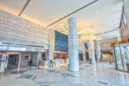 Yuting Hualong Hotel (Yongjia Wuniu Branch) Отели в г. Юнцзя