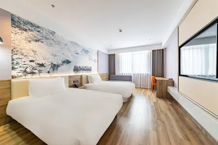 Home Inn Hotel Отели рядом с достопримечательностью «Longchuan Square»