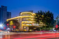 Rezen Dong Hotel (Baodingshi Chaoyang Beidajie Baobai Shopping Plaza)