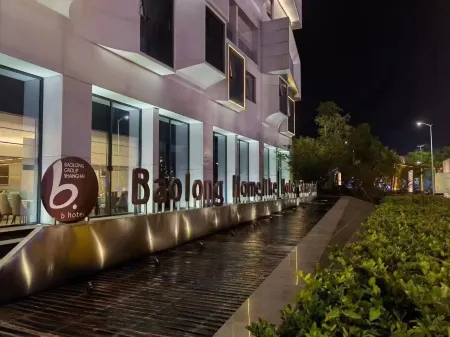 Shanghai Baolong Home Hotel (Ma'anshan Dangtu East Station Branch) Отели в г. Данту