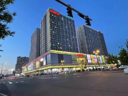 Ouli Smart Homestay (Daqing Wanda Plaza) Отели рядом с достопримечательностью «Daqing Normal University»