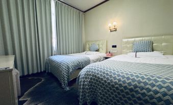 Yajiang Zhangyu Business Hotel