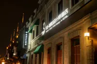 鳳朝陽設計師飯店(煙台站第一海水浴場店) 煙台自然博物館附近的飯店