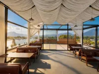 Beyond the Clouds · Golden Sunrise | Snow Mountain & Lake View Secret Garden Hote Hotels in Lijiang