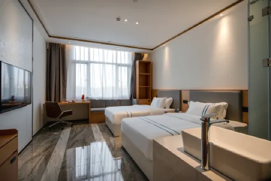 Haikou Yongxuan Hotel (Hainan Institute of Business and Technology) Отели рядом с достопримечательностью «Hainan Sports Training Hall»