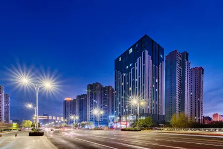 Shankee Tea Style Hotel (Xinxiang Municipal Government East Railway Station) Отели рядом с достопримечательностью «Xinxiang University»