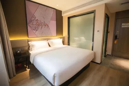 IU Hotel（Anyue Ningdu Avenue Red Star Macalline Store） - 2-Star