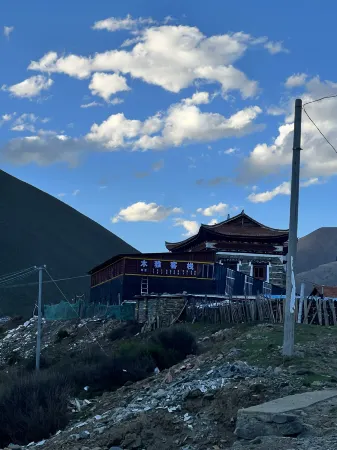 Kangding Muya Inn Отели рядом с достопримечательностью «Quanhua Shoal»