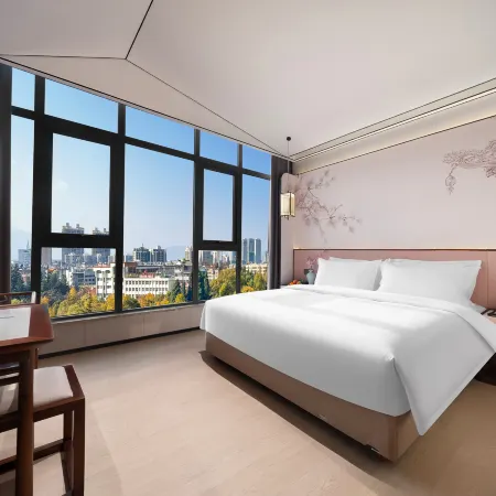 Moshang Qingju Hotel (Shenqiu North Station . LongdingGuomao Branch)