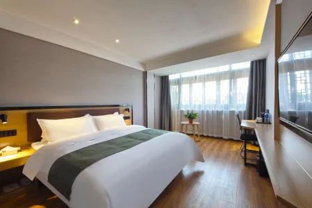 GreenTree Zhixuan Hotel (Sanhe Guzhen Scenic Area) Отели рядом с достопримечательностью «Yang Zhenning Former Residence»