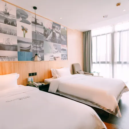 Qingmu Chain Hotel (Ma'an Shandong Railway Station Hongxing Meikailong RT-Mart)