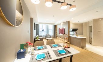 FCG  SUITES  BY  NEQTA