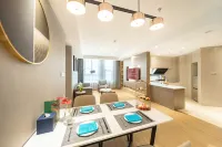 FCG  SUITES  BY  NEQTA