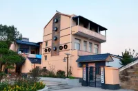 Wuhan huxingju farm machinery town Отели рядом с достопримечательностью «Пейзажный район Мулан Сантайшань»