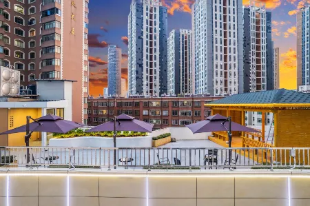 Tiangcheng Hotel (Tongde Plaza) Отели рядом с достопримечательностью «Kunming Waterfall Park»