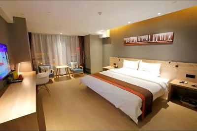 Junyi Chain Hotel (Zhongshan Bus Terminal) Hôtels à : Zhongshan