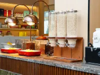 Tuan Ming Yunju Hotel - servizio colazione
