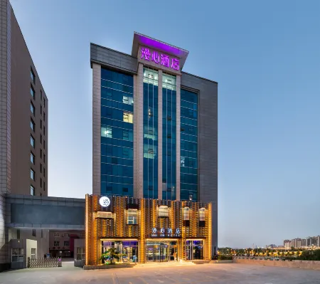 Manxin Hotel (Linyi Yingbin Avenue Xinbaihui Branch) Отели в г. Линьфэнь