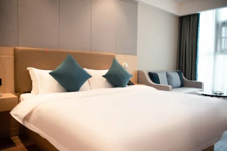 Geyiya Light Journey Hotel (Universal Center Jincheng Lake Metro Station Branch) Отели рядом с достопримечательностью «Tiexiang Temple»