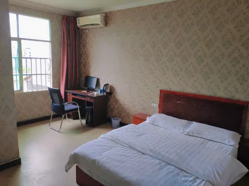 Shizhu Jiuhui Hotel - Inns