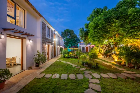 Weizhou Island Yihua Yiye Garden Homestay Отели рядом с достопримечательностью «Weizhou Island»