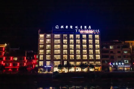 Qixinlong Sightseeing Hotel Отели рядом с достопримечательностью «Zhusheng Bridge»