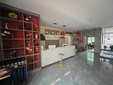 Muli Kangba Hotel Отели рядом с достопримечательностью «Шэнь Гуан Начальная Школа Уезда Мули»