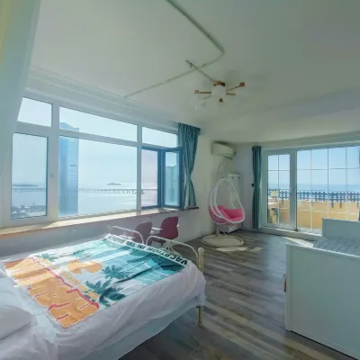 Dalian Yipin Fashion Leisure Apartment Отели рядом с достопримечательностью «Парк Синхай»