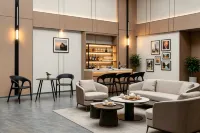 Rezen Borui Hotel (Guangzhou Baiyun Station Ezhangtan Subway Station) - bar
