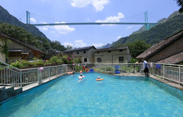 Xiaohuajiang Buyi Qiaoyuan Homestay