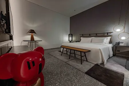 HUI Hotel (Riyuebei Branch, Qinglv Road, Zhuhai) Отели рядом с достопримечательностью «Gong Amusement Park»