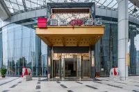 Echarm Plus Hotel (Foshan Zhihui Xincheng Subway Station) Отели рядом с достопримечательностью «Центральная площадь Локунь»