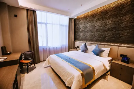Bamin Hotel Apartment Отели рядом с достопримечательностью «Yike Zhaomeng Monument»