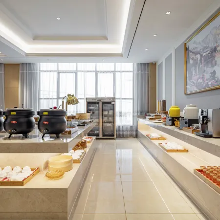 Vienna Hotel (Shangqiu Jixian Passenger Transport Terminal Jinhui Mong Kok Branch)