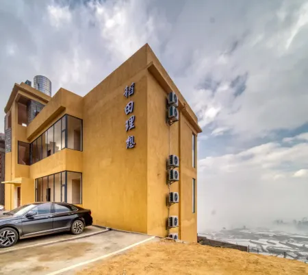 Daotian Lixiang Blue Terrace Scenic Homestay (No. 2) Отели рядом с достопримечательностью «Duoyishu Terraced Field»